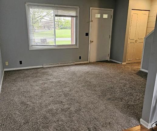 Note - Kitchen is now tiled - this view is into the living room from the kitchen