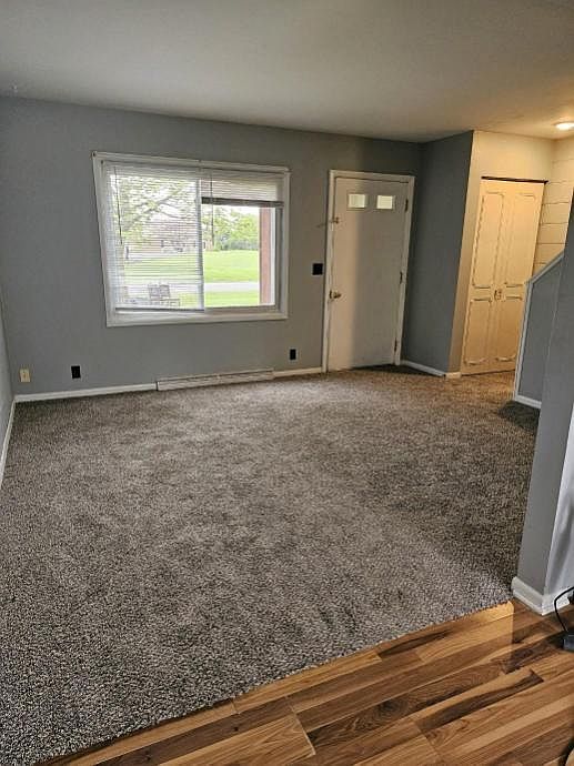 Note - Kitchen is now tiled - this view is into the living room from the kitchen
