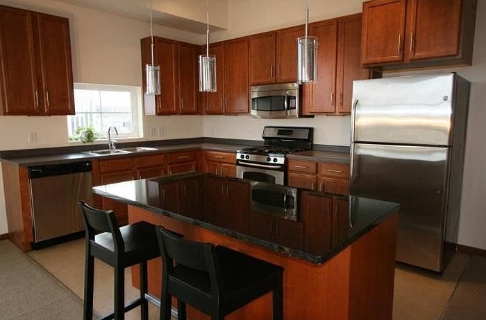 Kitchen with Stainless Appliances, Granite and Gas Range