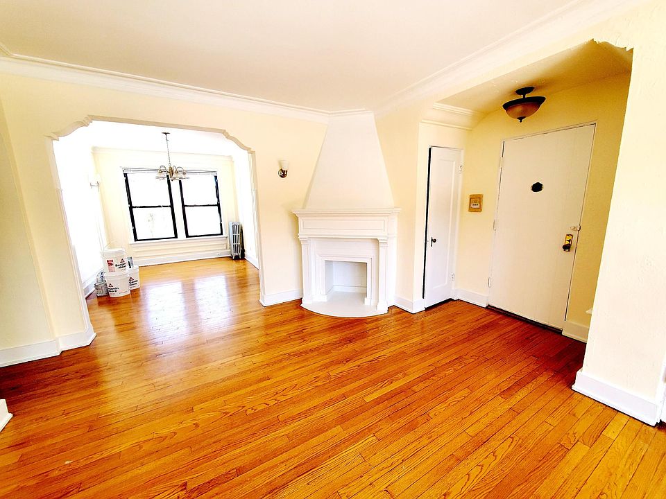 Living room with Faux Pueblo Fireplace