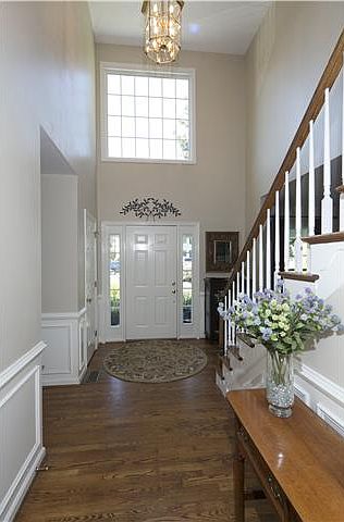 Two Story Foyer is open and bright !