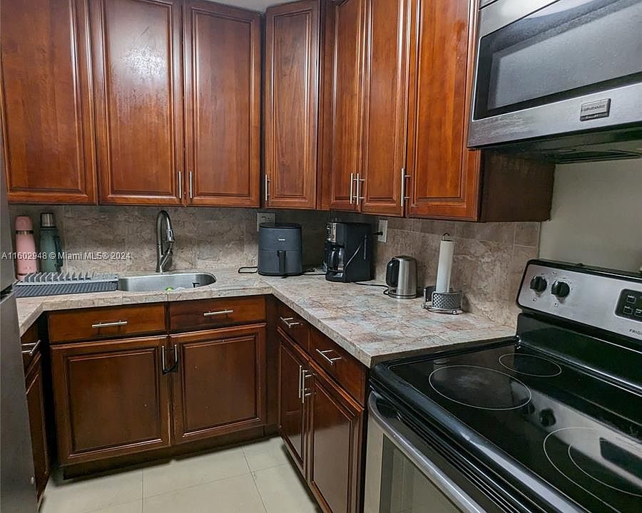 1st image of 1555 W 44th Pl APT 207