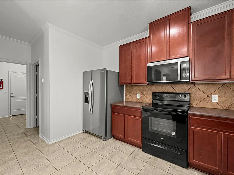 10909 Helms Deep Dr — Photo 10