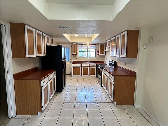 4th image of 6421 S Briar Bayou Dr