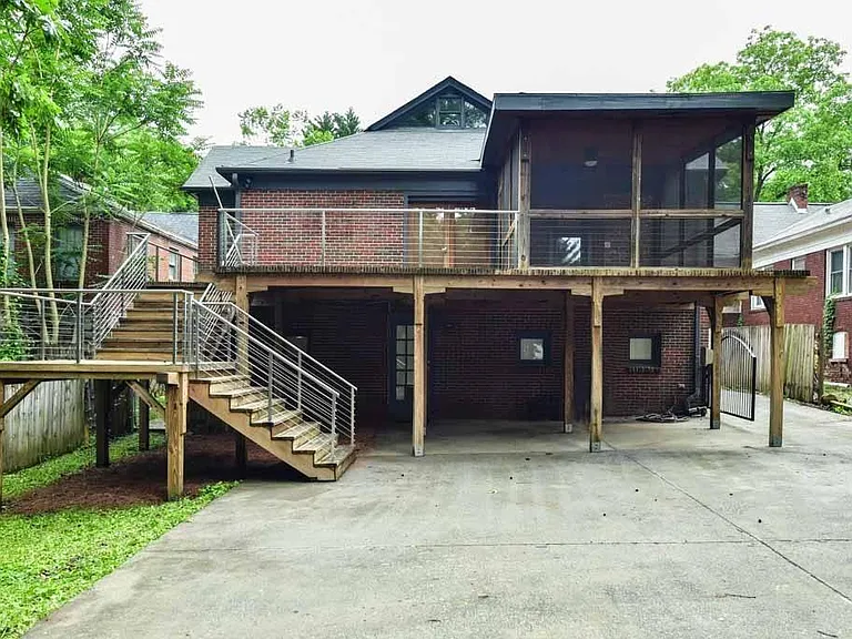 Plenty of gated parking in the back! Covered, private entrance located beneath the patio