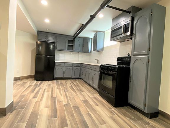 2nd image of 130 Lawton St Floor Basement