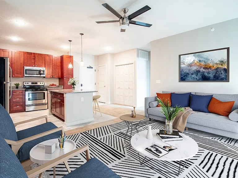 Staged kitchen and living room at Avenue 204.