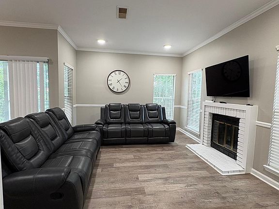 living room with sofa and TV