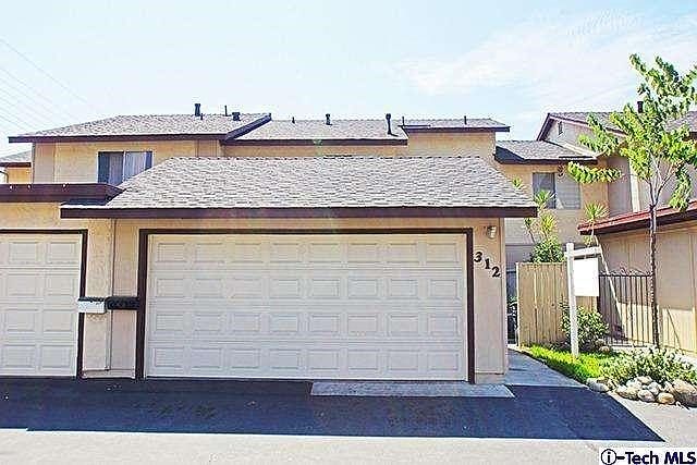 Townhome with 2 car attached garage.