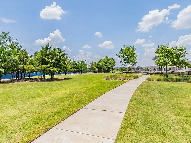 large green space with walking paths