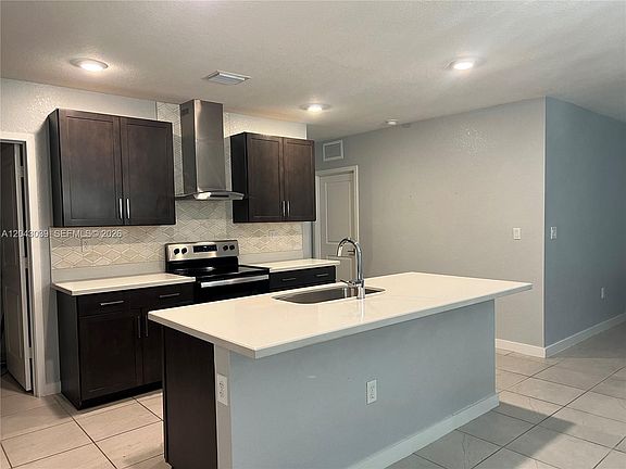 3rd image of 421 NE 6th Ct