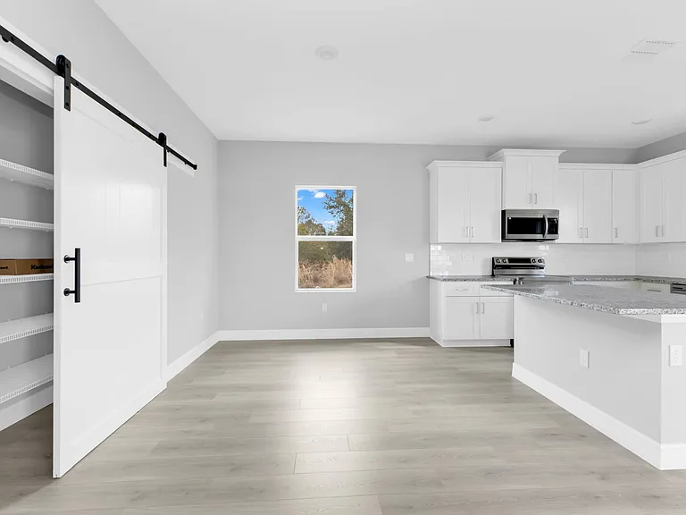 Builder provided photos - actual layout is reversed. Specific finishes may vary.