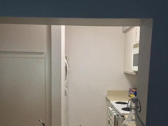 Looking into Kitchen From Breakfast Bar
