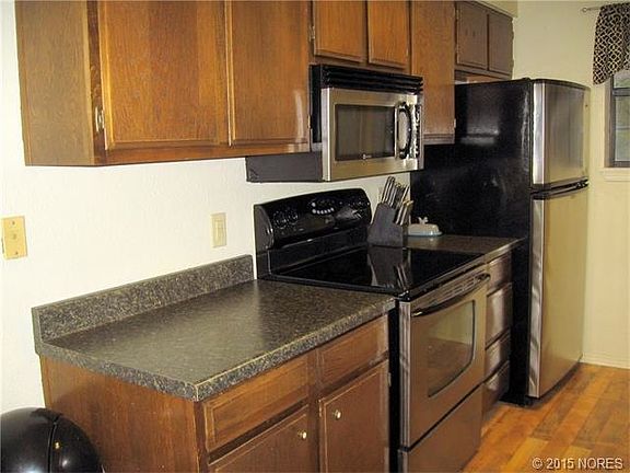 Kitchen with new built in microwave.