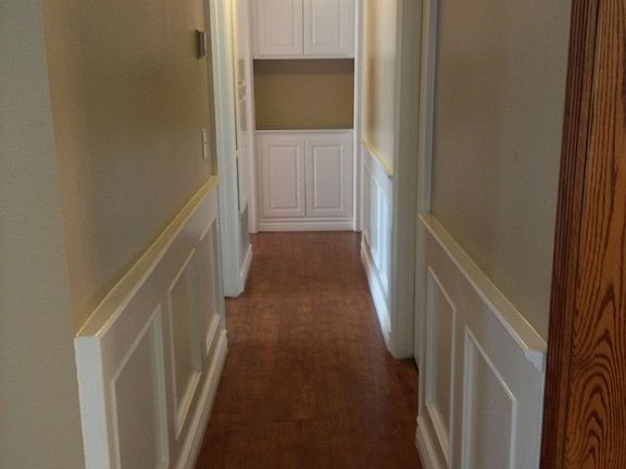 Hallway with wainscotting