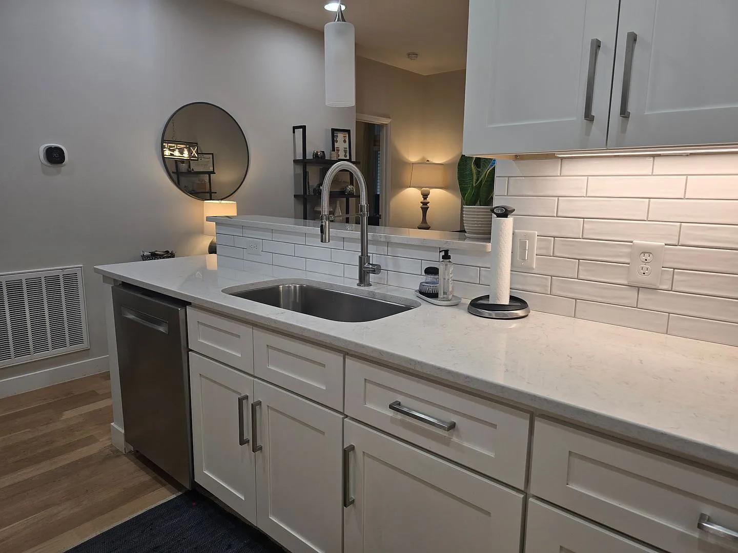 Sleek First-Floor Condo with Park-View Patio & High-End Finishes — Photo 2