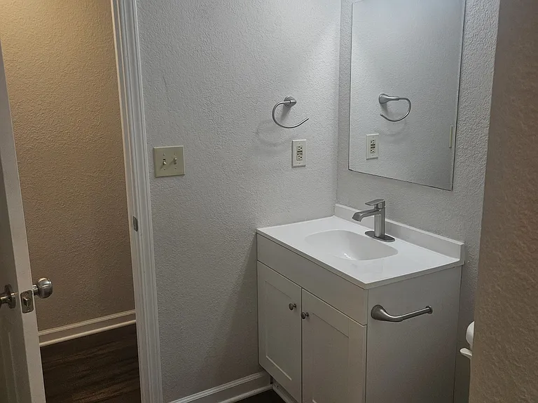 master bathroom which connects to hallway