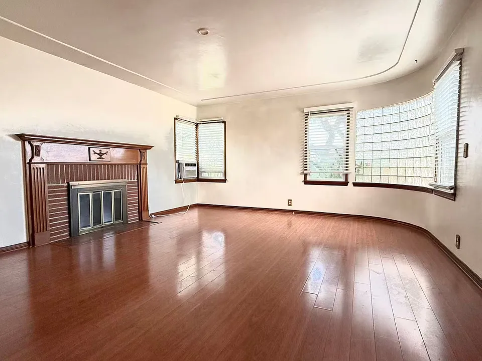 Living Room with fireplace, spacious, bright