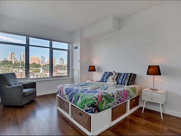 Giant Master Bed w/ ensuite and custom his/hers closet wall