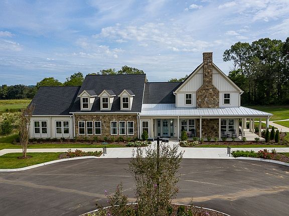 Enjoy community amenities including a swimming pool and clubhouse.