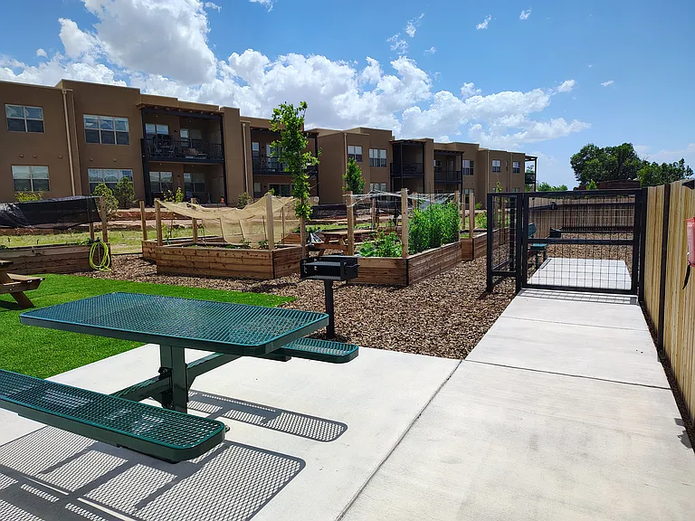 Community garden and dog walk in the property.