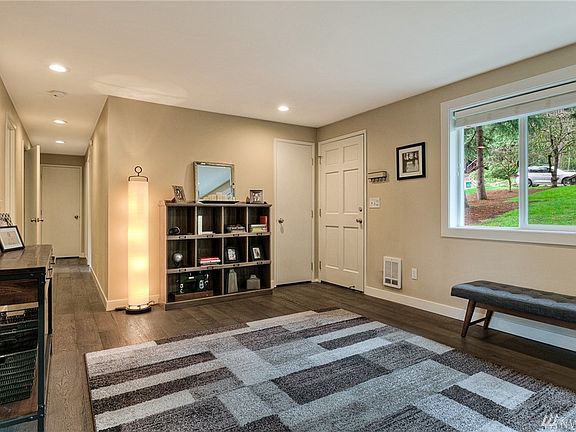 Hallway leads to 3 bedrooms and 1 full bath on the main floor.