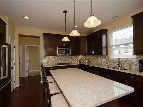 GRANITE COUNTERS 42 IN. CABINETS, CERAMIC BACKSPLASH, ALL STAINLESS STEEL APPLIANCES