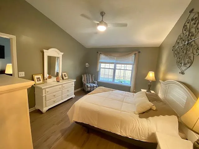 Master Bedroom with brand new queen-size mattress and view of enclosed patio