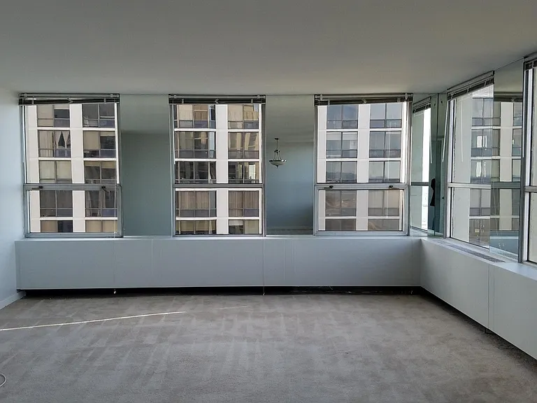 Living Room - Faces the lake on east and 2650 Apartment in t