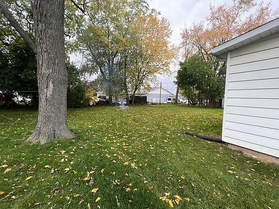 Side yard looking into back. South side of garage