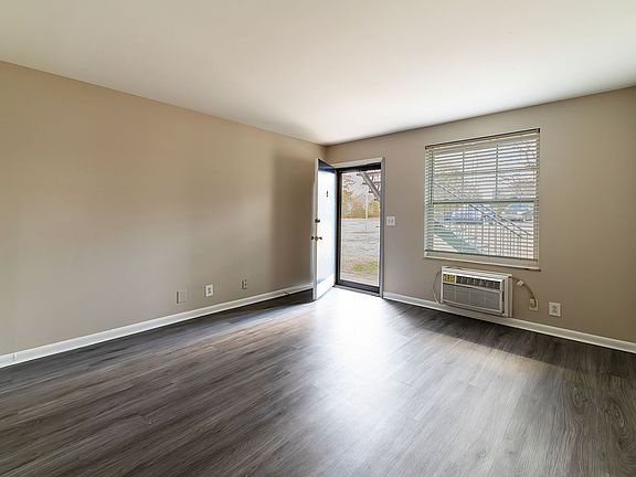 Embrace the potential of this bright living area, perfect for crafting your dream space.