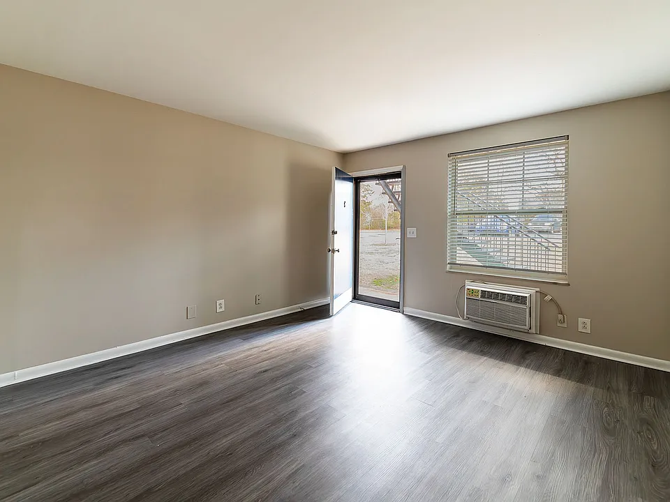 Embrace the potential of this bright living area, perfect for crafting your dream space.