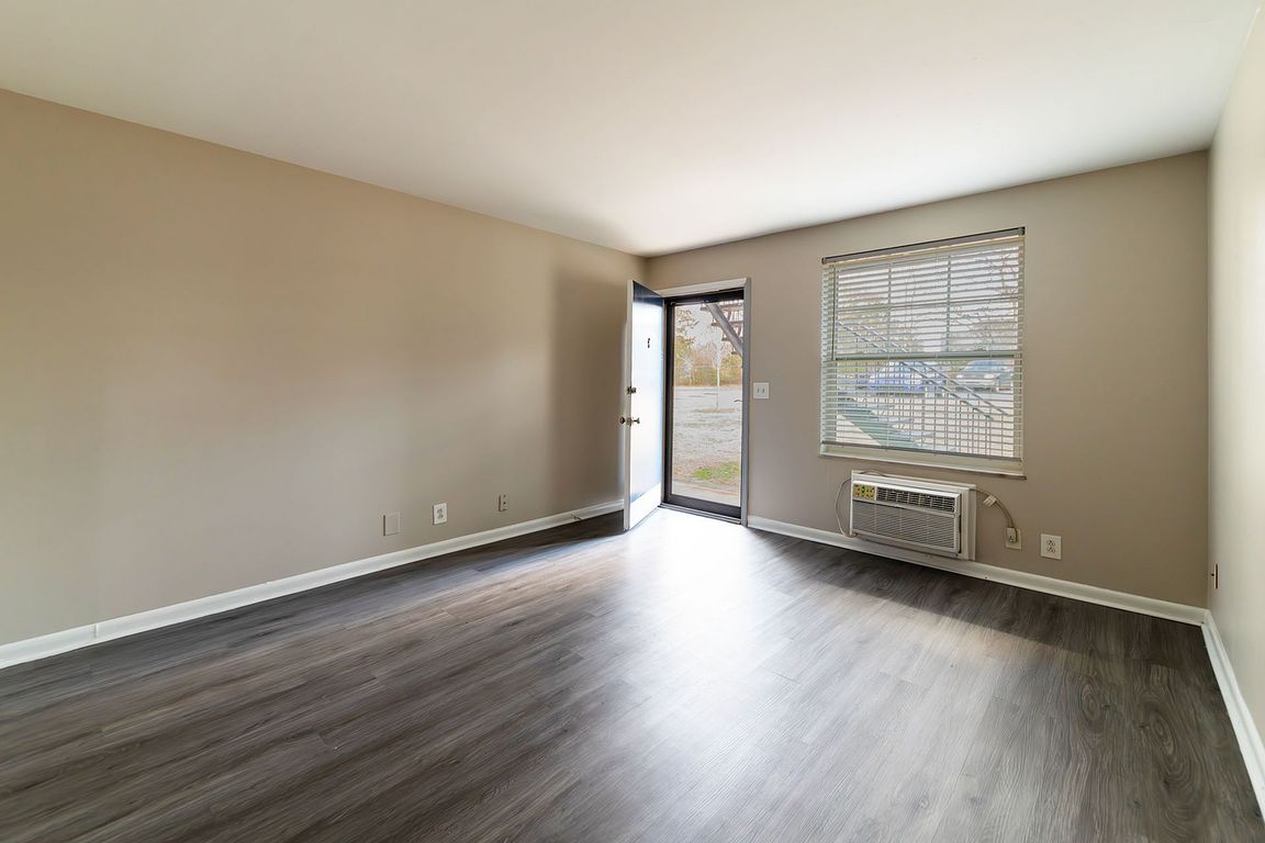 Embrace the potential of this bright living area, perfect for crafting your dream space.