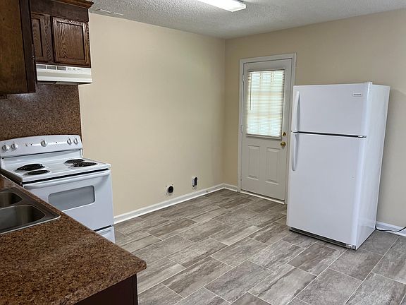 Kitchen with Stove and Refrigerator