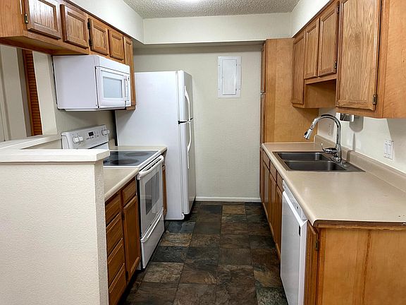 Kitchen with new dishwasher.