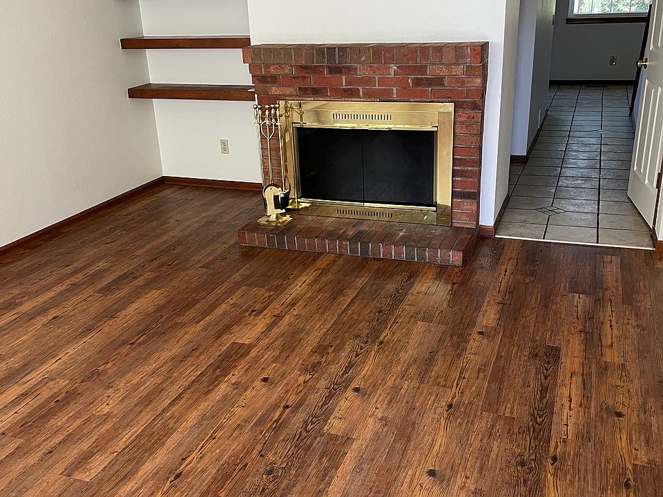 Laminate flooring, built-ins and wood-burning fireplace!