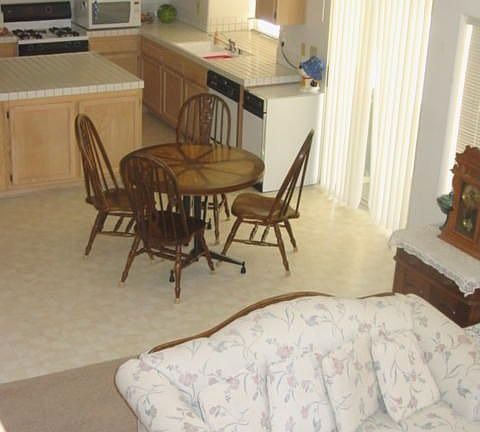 View to fam rm & kitchen from stairway 