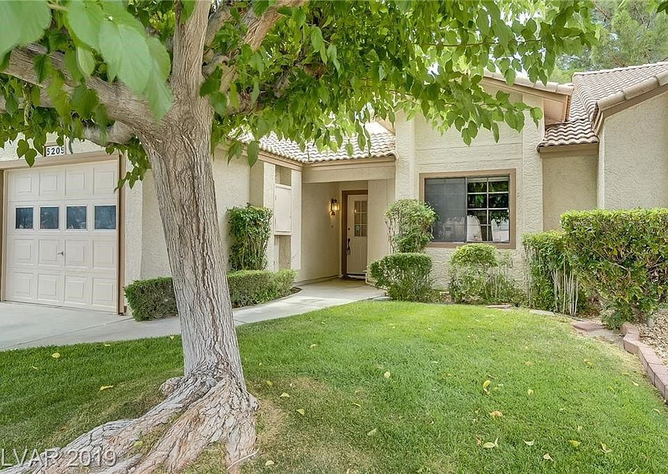 Tree-Lined Street and Beautiful Front Lawn Maintained by Los Prados!