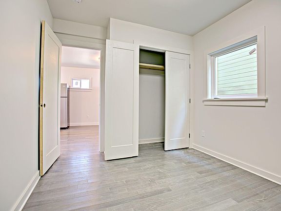 Bedroom on main floor with nice size closet and casement/egress window