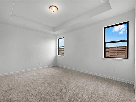 Primary bedroom. Sample product photo. Actual exterior and interior selections may vary by homesite.