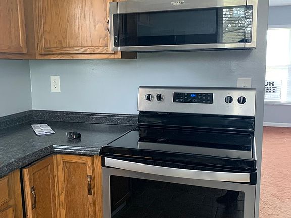 New counter tops and a new sink match all the appliances well.