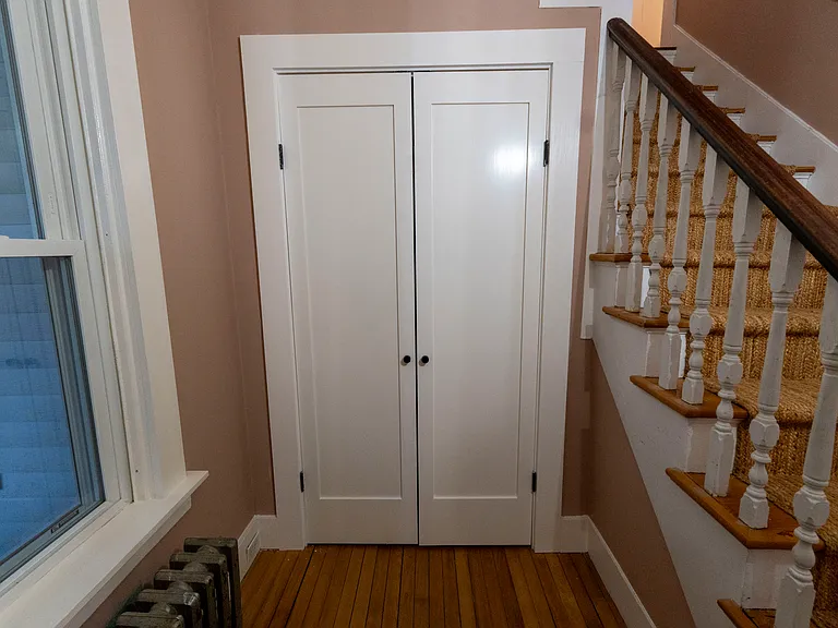 Large closet at the entrance, charming staircase with historic detailing. The entire apartment has been repainted.