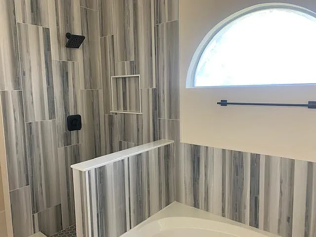 Updated master shower and bath. Shower glass installed after pictures taken.