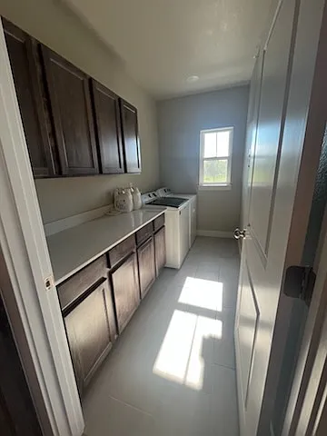 Laundry room with washer and dryer