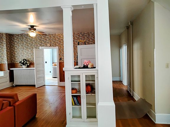 Facing east, dining room and downstairs hall.