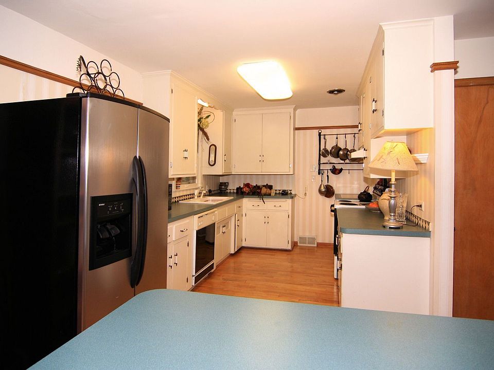 The galley kitchen has new light fixtures (not shown).