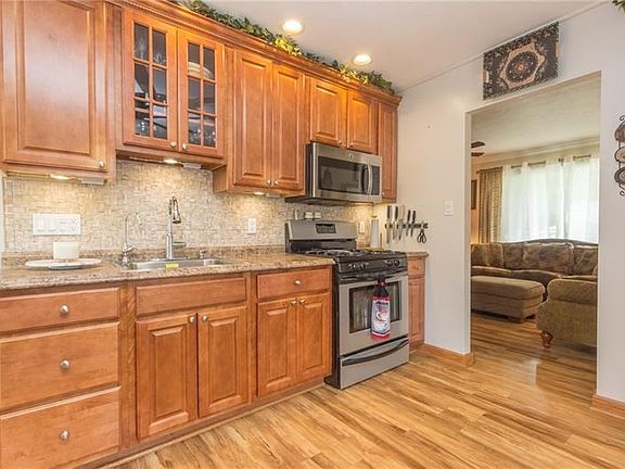 Timeless finishes in the nice sized kitchen.