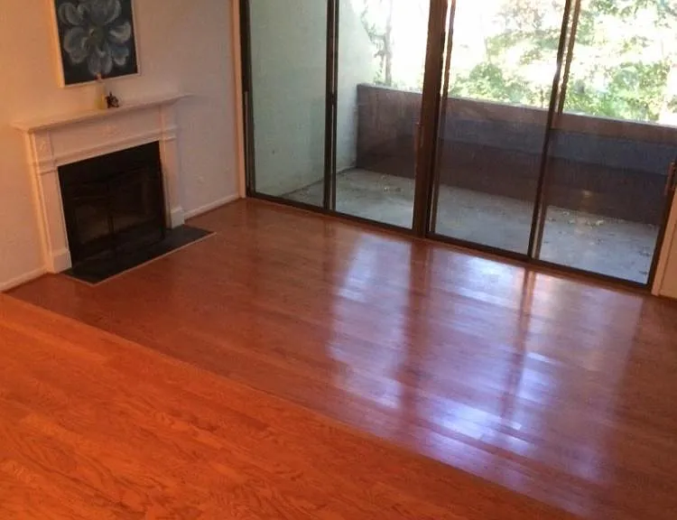 Empty living room (with elevated dining area above)