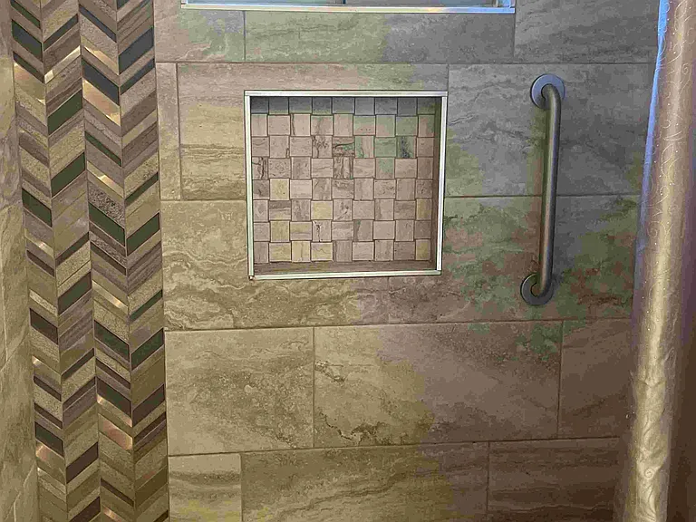 Master ensuite custom walk in shower with niche, window and disability bar plus ADA toilets and contemporary square sinks and granite all around!