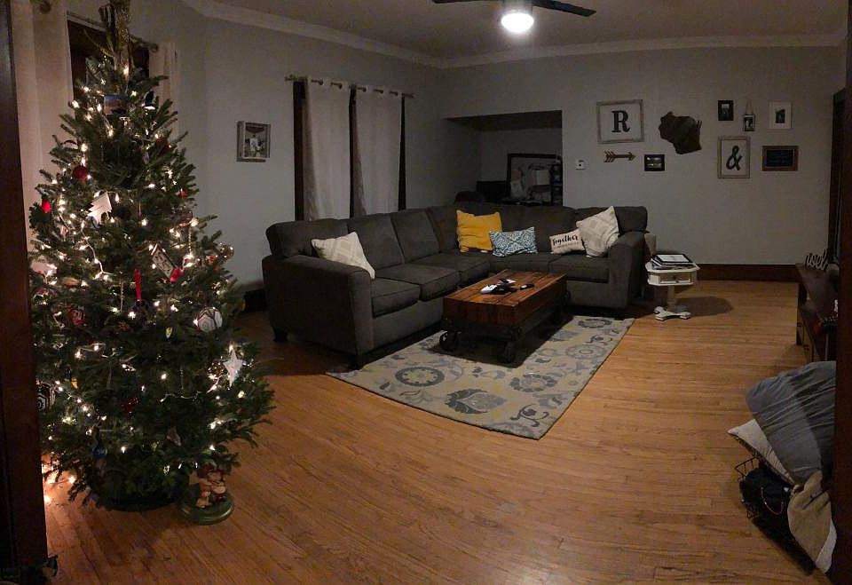 Large living space with open concept into dining area